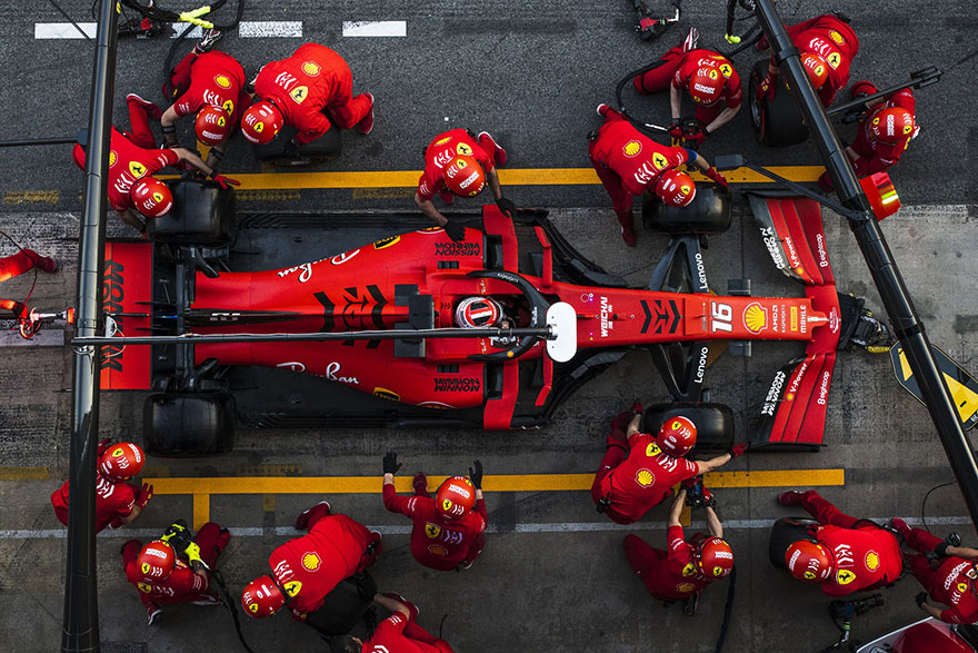top view of pit crew working on a formula 1 car
