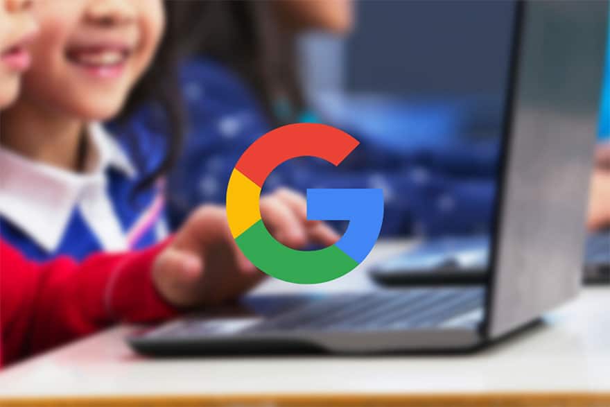 Children sitting behind a laptop blurred out with Google icon in middle of photo